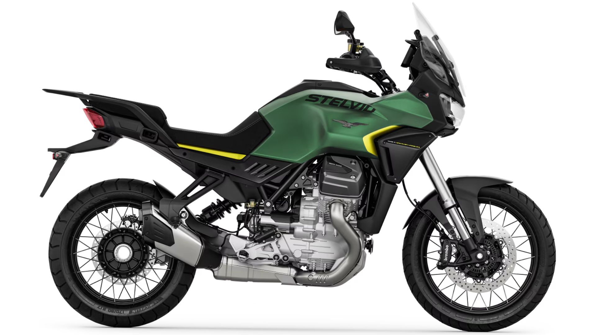 Avanturistični motocikel Moto Guzzi Stelvio v ZELENA kombinaciji z rumenim detajlom, prikazan v levem bočnem profilu na belem ozadju.