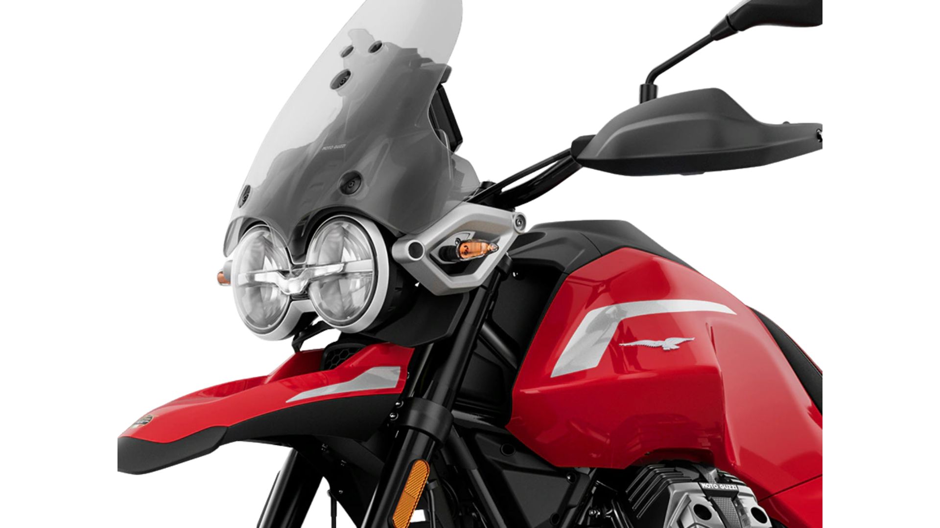 Bližnji posnetek sprednjega dela Moto Guzzi V85 TT: črno-platiščno kolo, Brembo zavore, vzmetenje in disk s perforacijami.