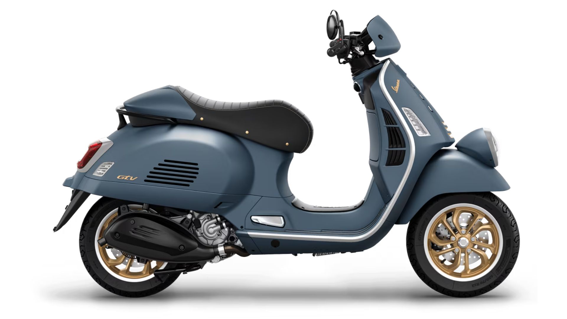 A side view of a Vespa GTV scooter with a matte blue color scheme and gold wheels, highlighting the sleek design, exhaust pipe, and rear suspension.