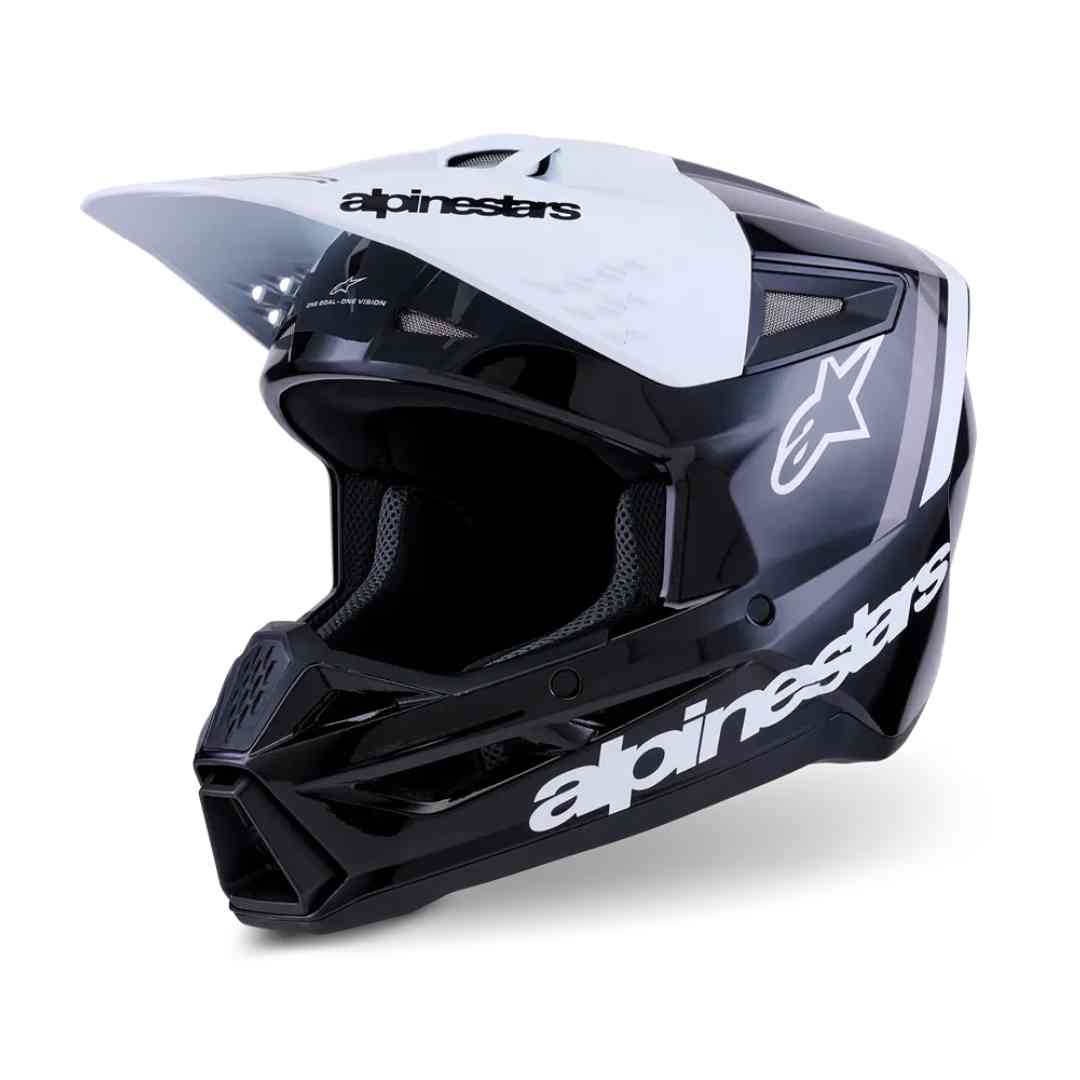 Kaciga Alpinestars crno-bijele boje s vizorom, pogled sprijeda.