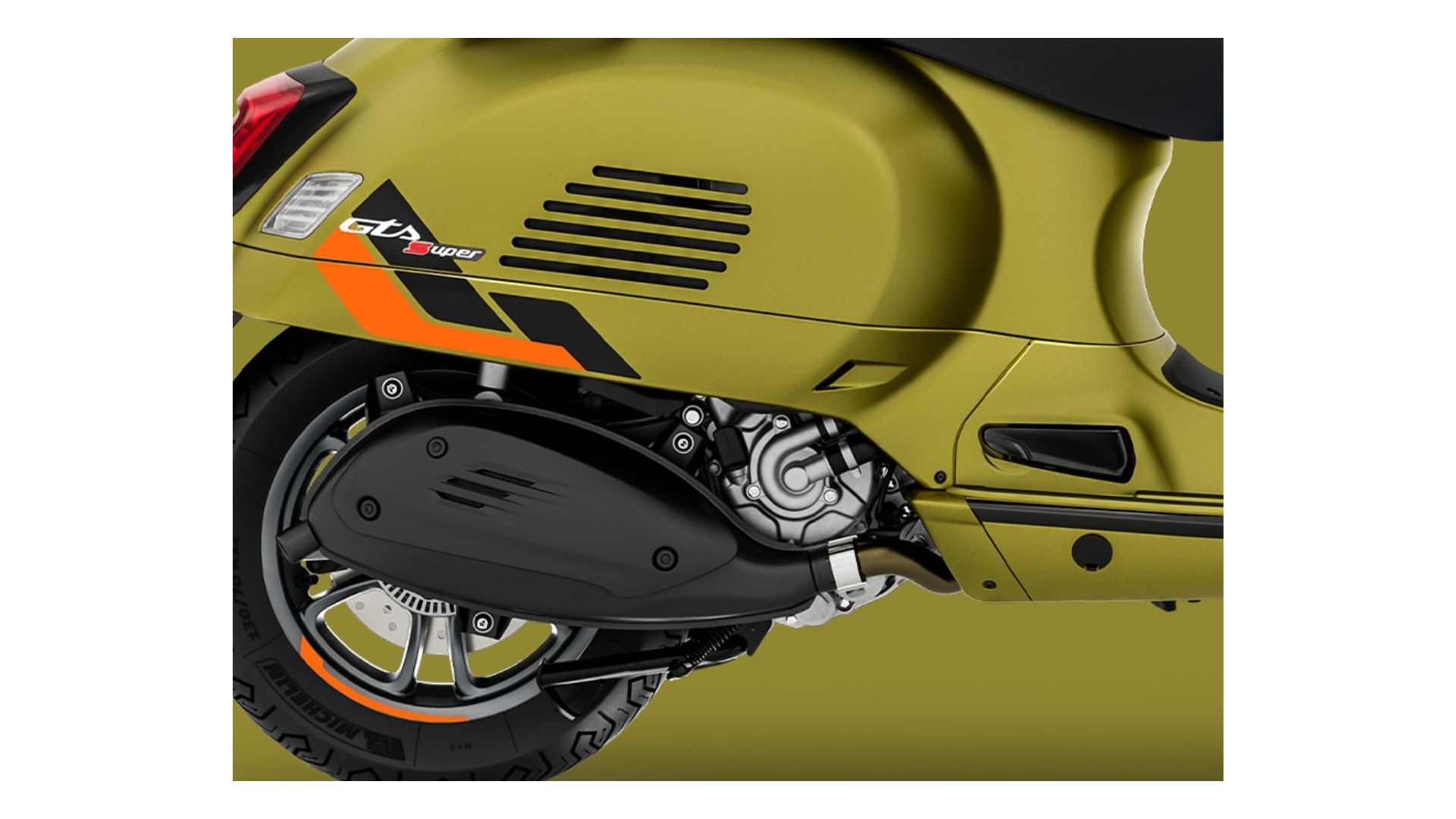 Another angle of the scooter's rear wheel area, focusing on the exhaust system and the sporty design of the scooter. The orange detail on the tire rim is highlighted, showing the bike's performance-oriented aesthetic.