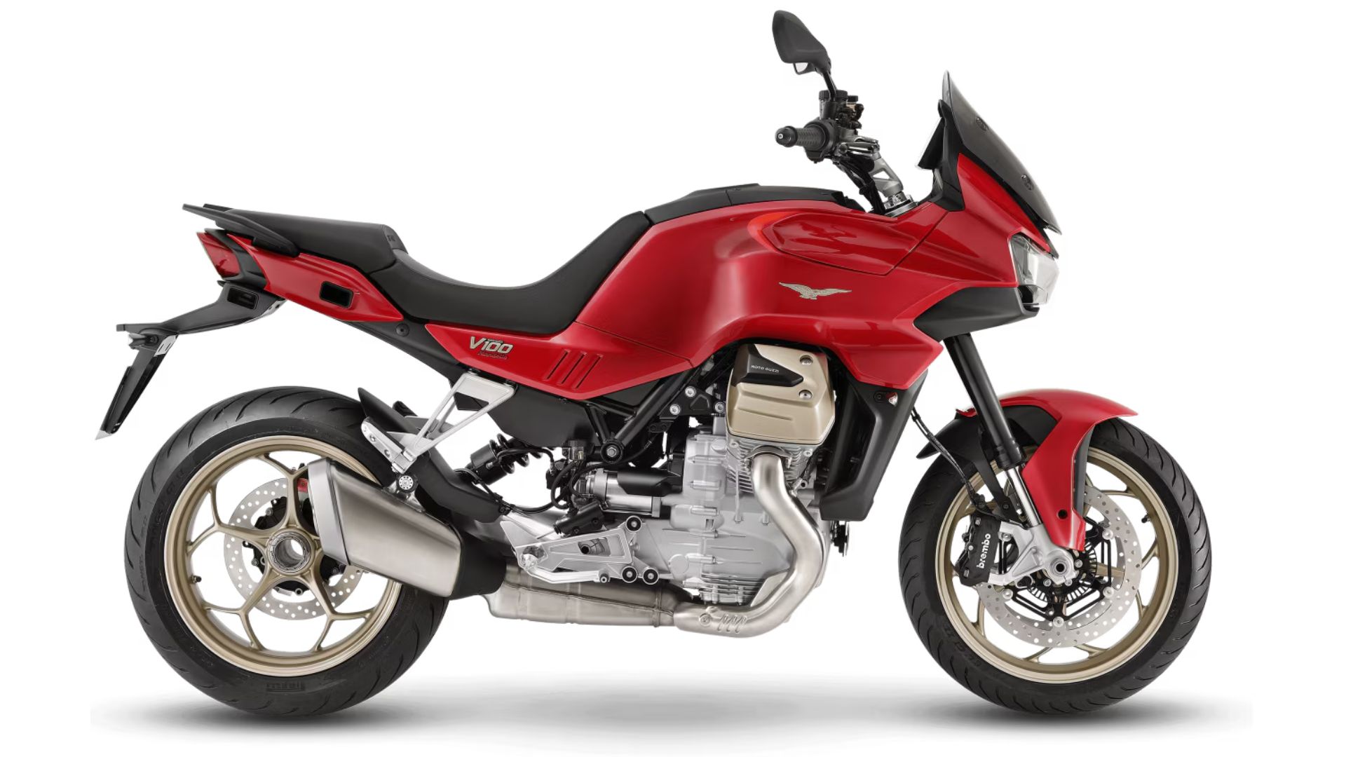 Moto Guzzi V100 Mandello v rdeči barvi, fotografiran v profilu na belem ozadju.