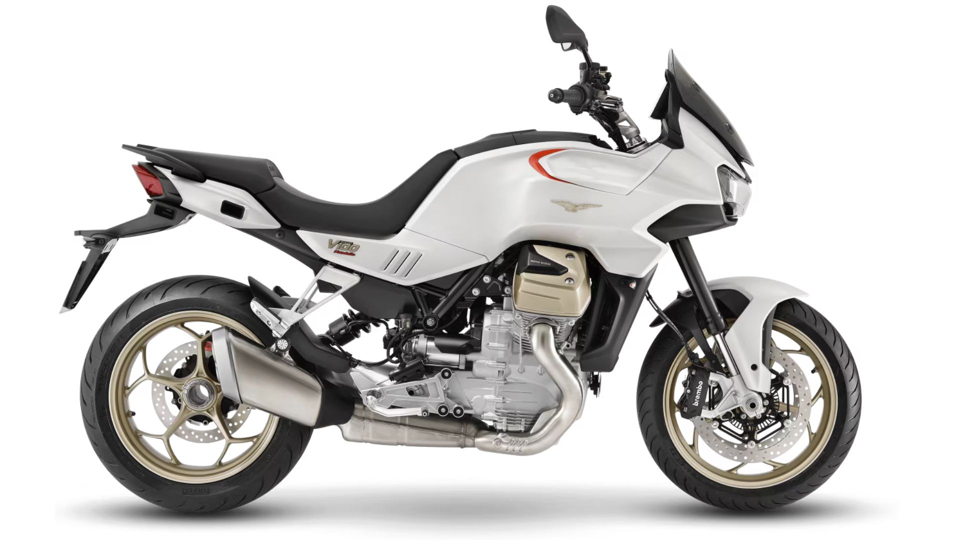 Moto Guzzi V100 Mandello v beli barvi, fotografiran v profilu na belem ozadju.