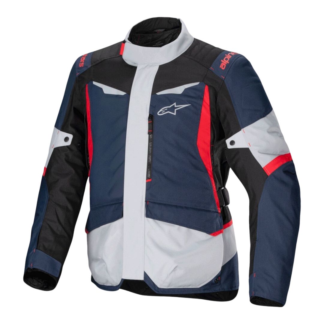 "Motoristična jakna Alpinestars v temno modri, sivi, črni in rdeči barvni kombinaciji, prikazana s sprednje strani, z izrazitimi kontrastnimi paneli in logotipom na prsih."